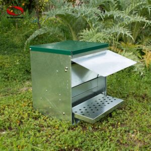 Treadle Chicken feeder in action open